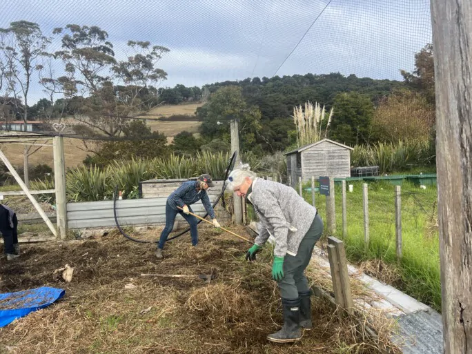 Dell and Maria working in the Marae garden